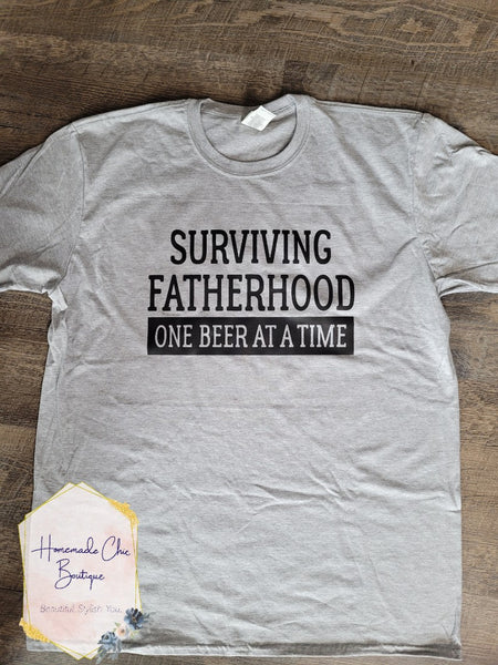 Surviving Fatherhood Graphic Tee
